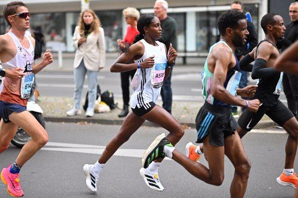 Assefa smashes world marathon record in Berlin with 2:11:53