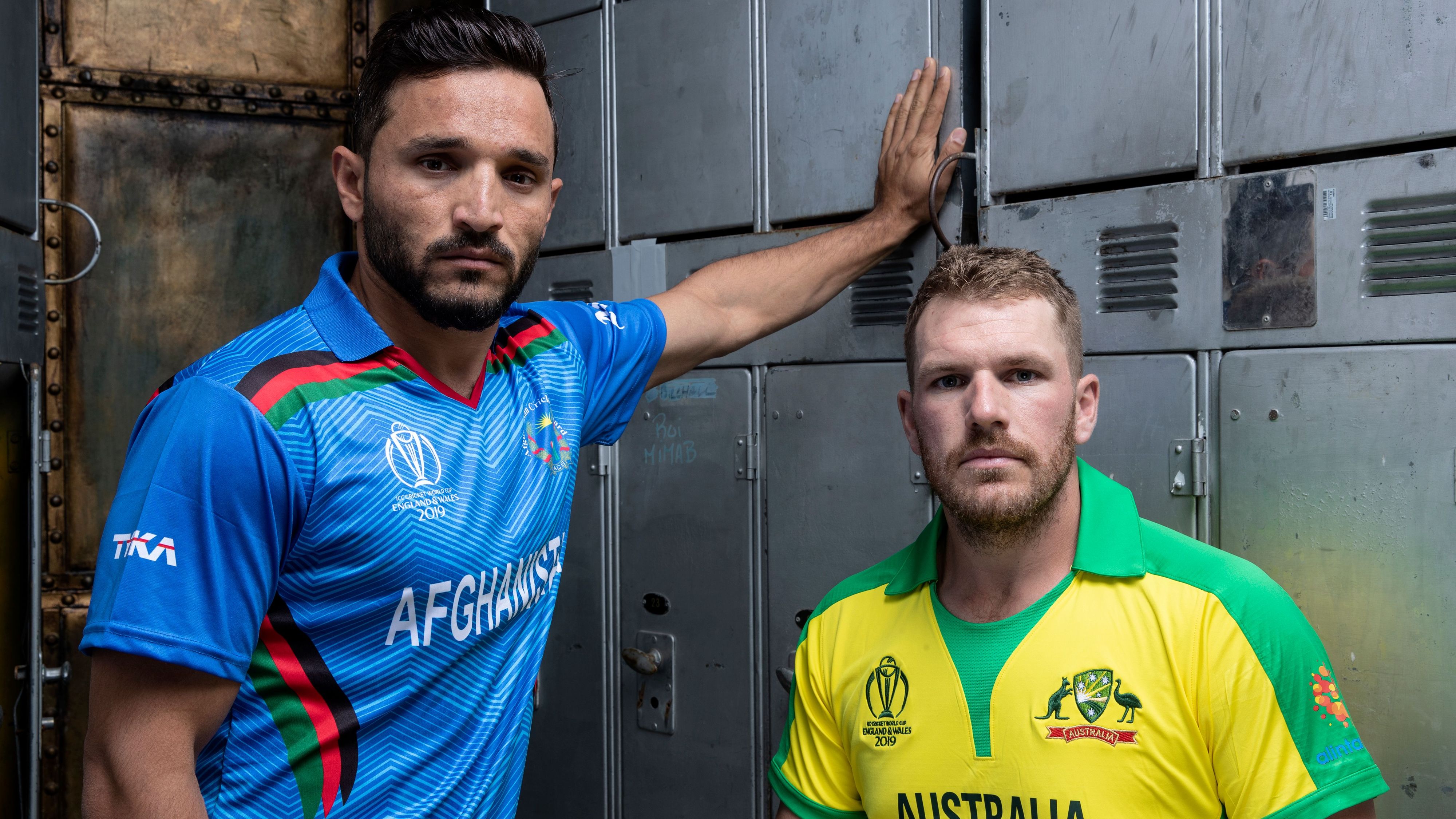 Gulbadin Naib with Aaron Finch in a photo session 