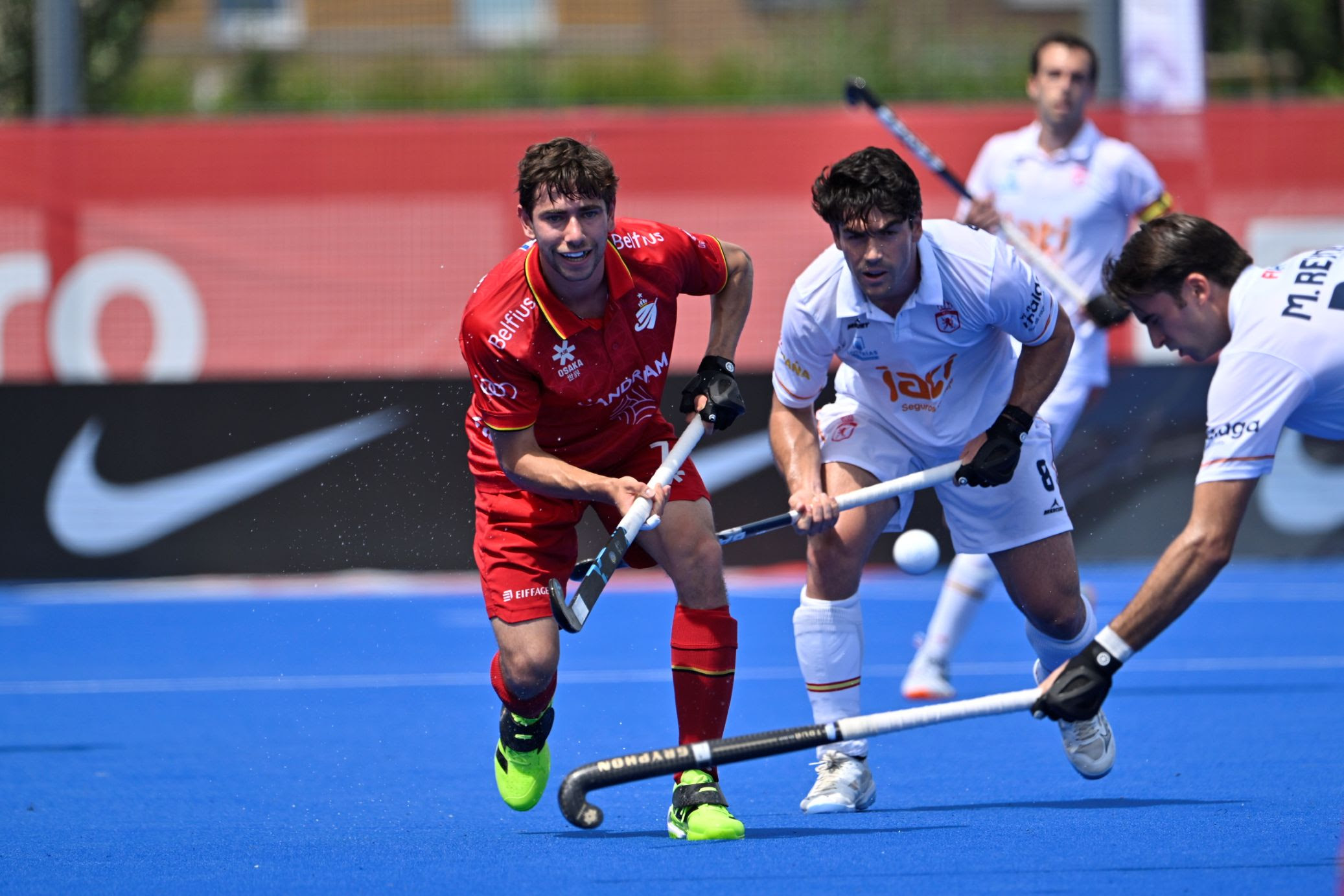 Belgium men edge closer to title as Hockeyroos pull off shootout win over England